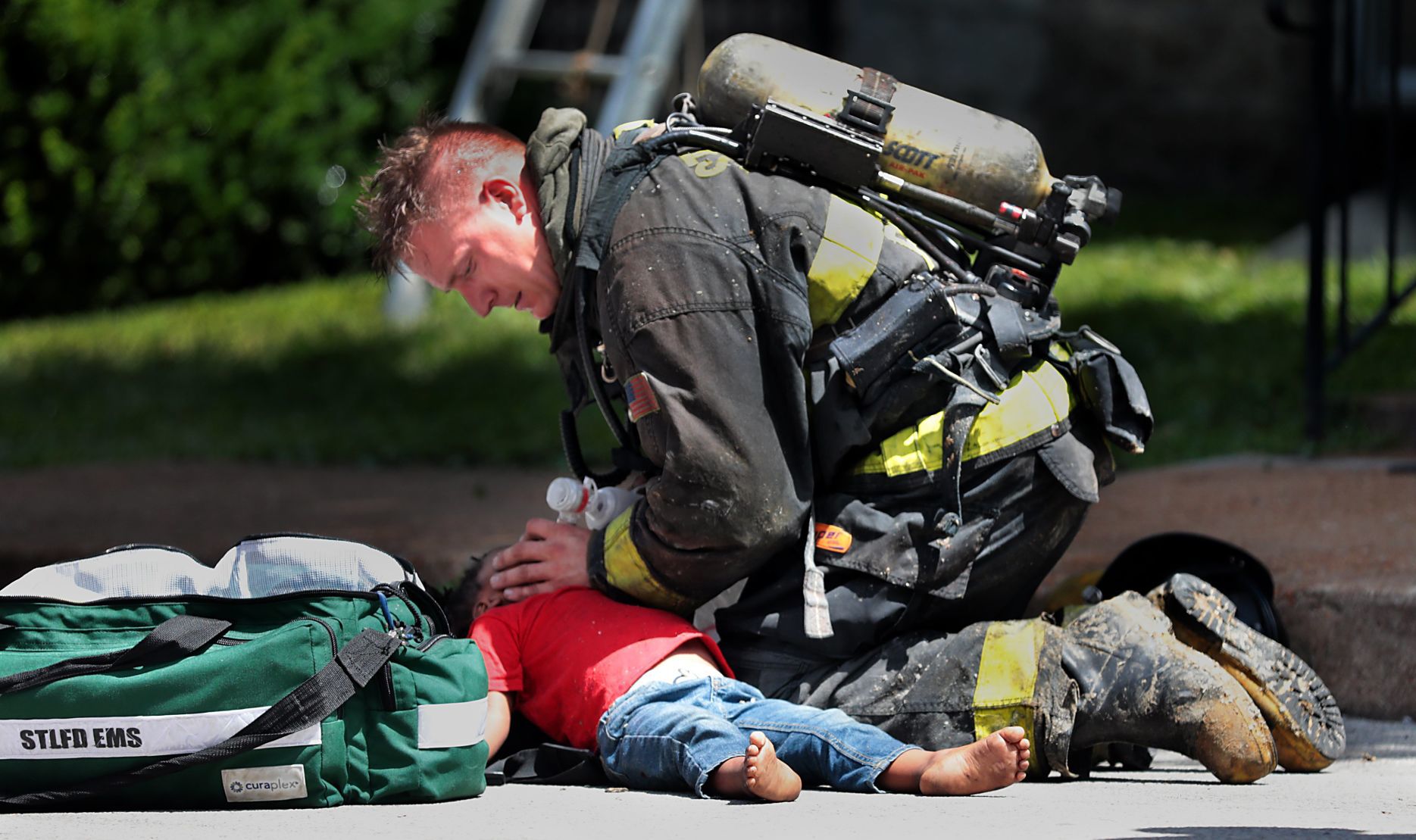 After firefighters rescue four children, parents are charged
